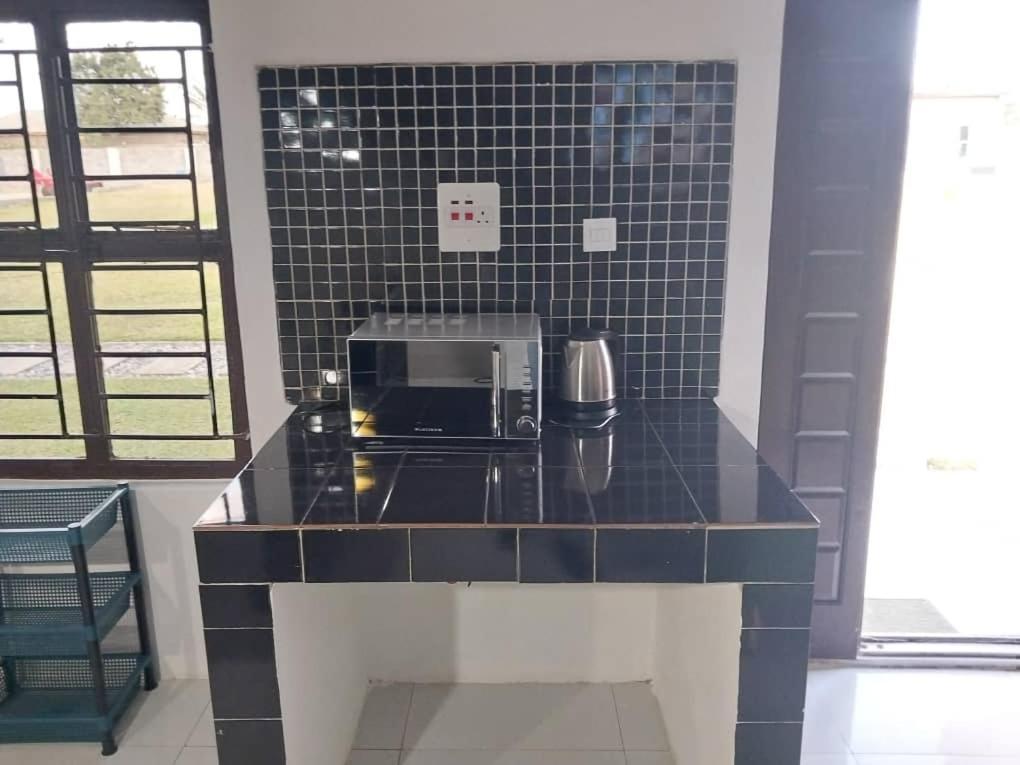 Emmrose Apartments Чингола Екстериор снимка