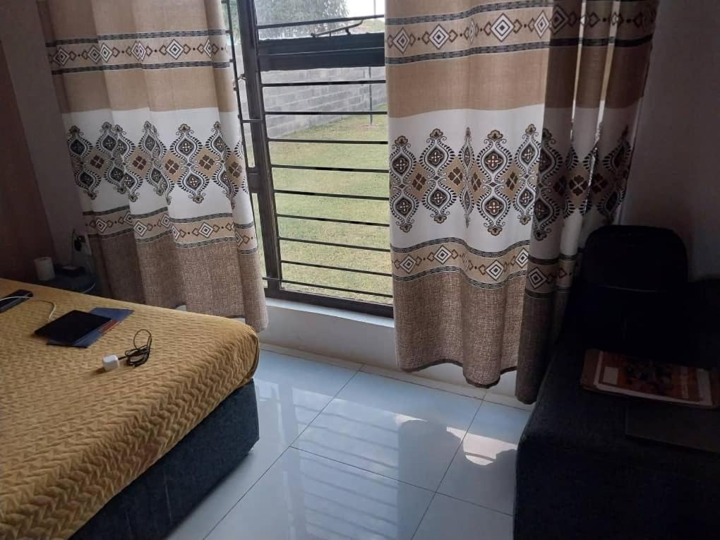 Emmrose Apartments Чингола Екстериор снимка